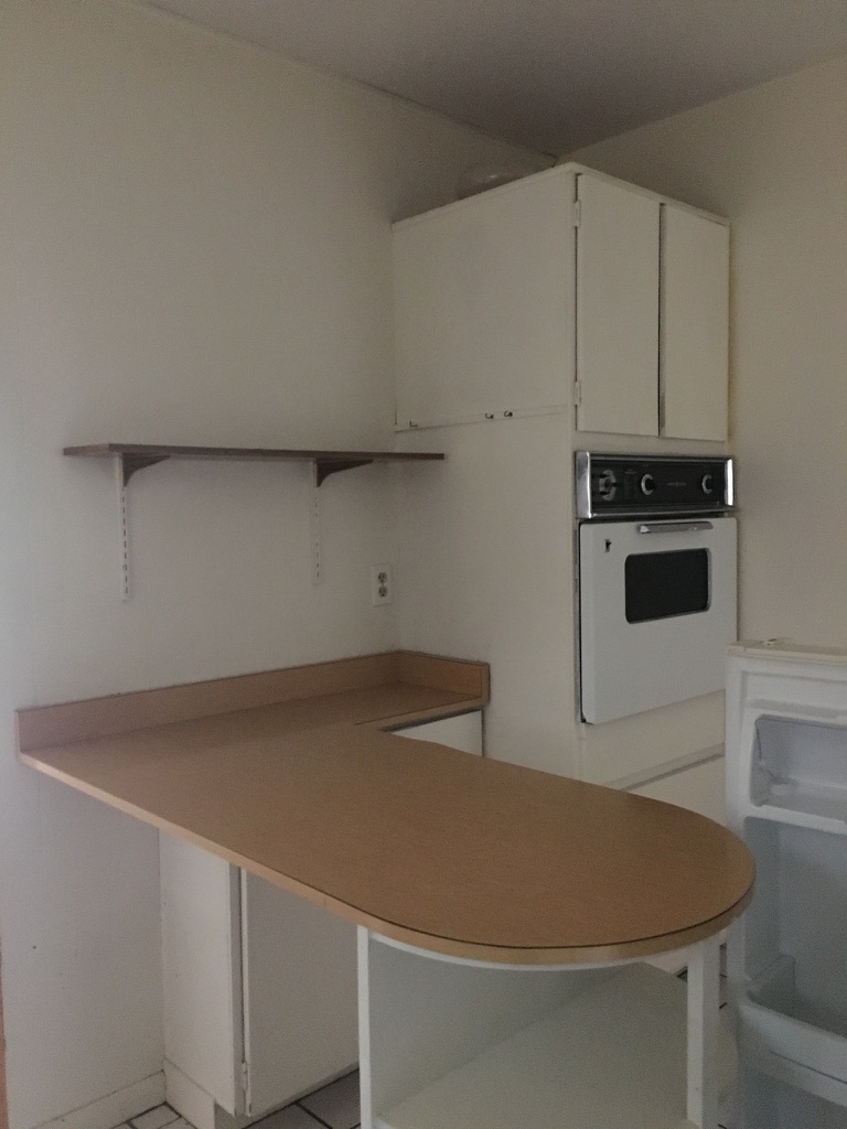 Outdated kitchen before renovation by 3Lotus