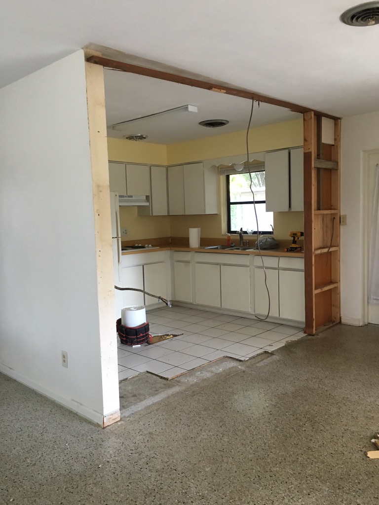 Wall removed to open up the kitchen during renovation by 3Lotus